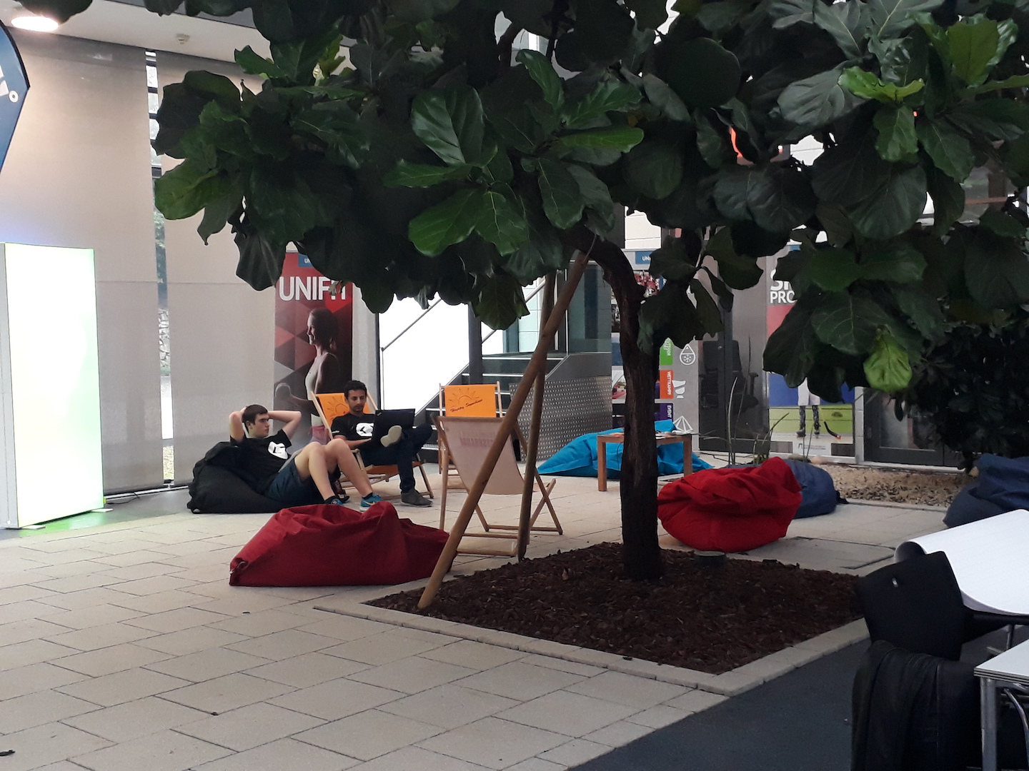 two participant are sitting in beanbags